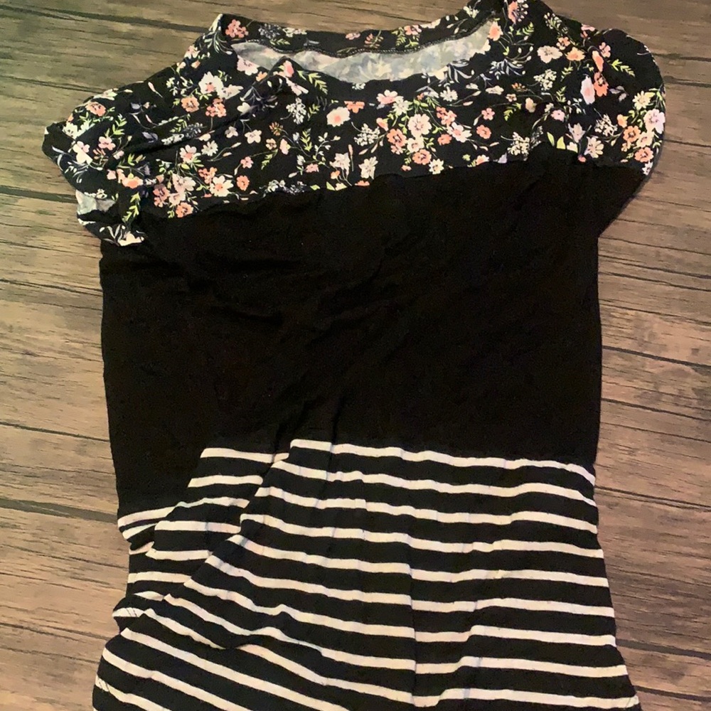 This is a black floral, striped shirt good for summer! Very good material!